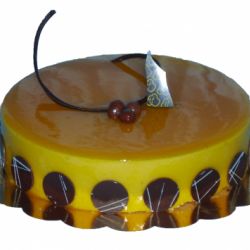 TROPICAL   Mousse de plátano, cremoso de coco y coulis de mango